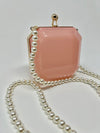 Pink Acrylic Clutch with Pearl Strap